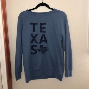 Woman’s blue Texas sweatshirt. Small.